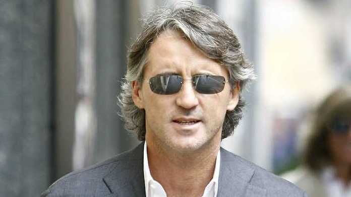 Mancini Roberto in centro a Milano per shopping Mancini