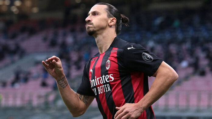 Zlatan Ibrahimovic of AC Milan celebrates after scoring to give the side a 2-0 lead during the Serie A match at Giuseppe