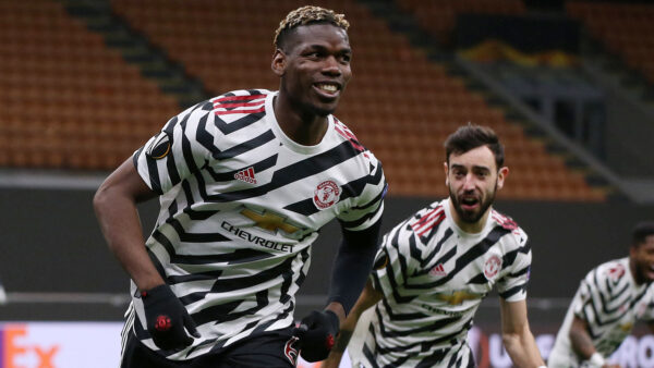 Paul Pogba of Manchester United, ManU celebrates with team mates after scoring to give the side a 1 0 lead during the UE