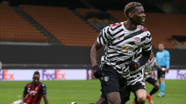 Paul Pogba of Manchester United, ManU celebrates with team mates after scoring to give the side a 1 0 lead during the UE